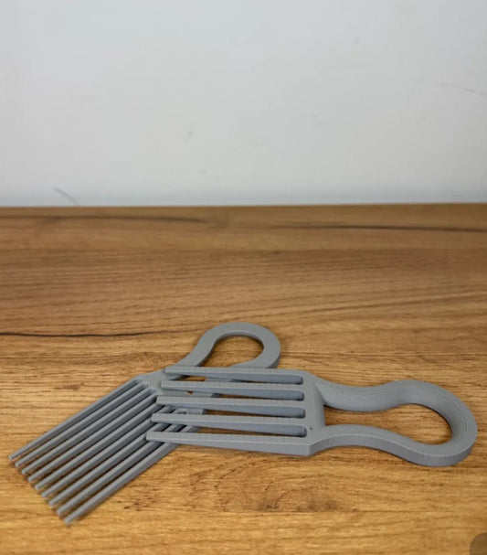 מנקה מברשות לשיער